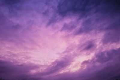 Low angle view of dramatic sky at sunset