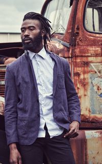 Portrait of young man in car