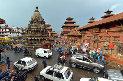 Cars parked outside a temple