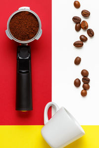 High angle view of coffee cups on table