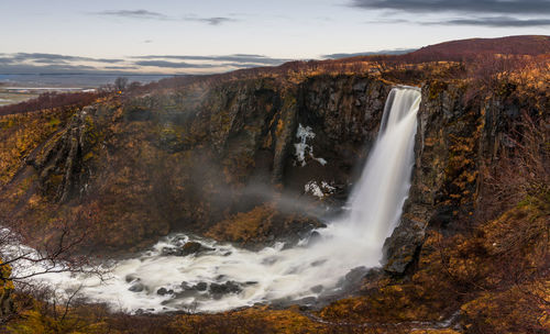 View of waterfall against sky