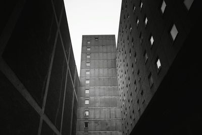 Low angle view of buildings against sky in city