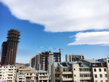 Low angle view of skyscrapers against sky