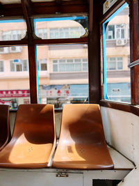 Empty seats on antique streetcar in hongkong 