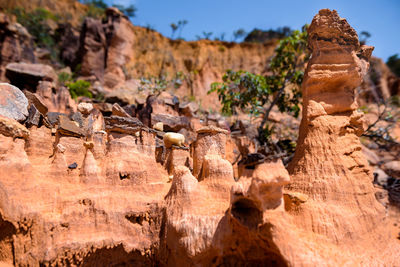 Panoramic view of rock formation against sky