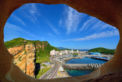 Panoramic view of landscape against cloudy sky