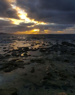 Scenic view of sea against sky during sunset