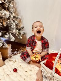 Portrait of cute baby girl with christmas decoration