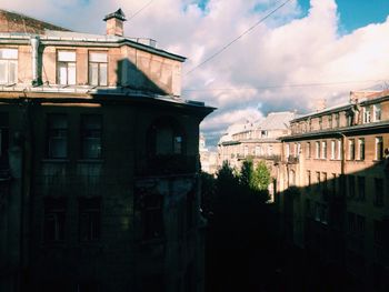 Houses against sky in city