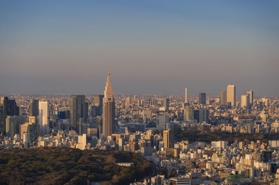 Modern buildings in city against sky