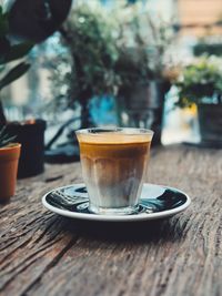 Close-up of coffee cup on table