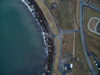 High angle view of road by sea