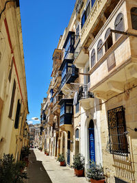 Low angle view of residential buildings against sky