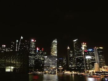 Low angle view of illuminated city at night