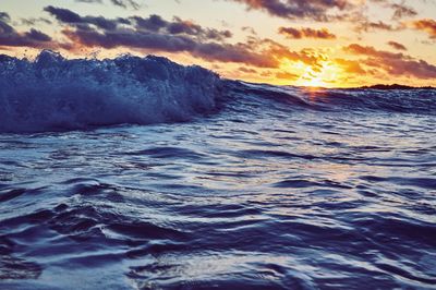 Scenic view of sea at sunset