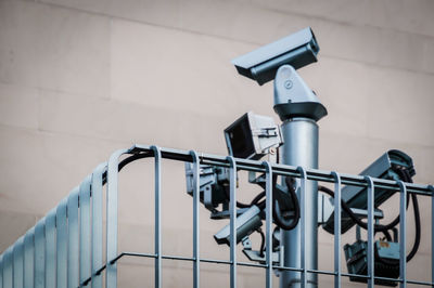 Close-up of coin-operated binoculars against blurred background