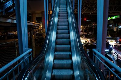 Illuminated bridge at night