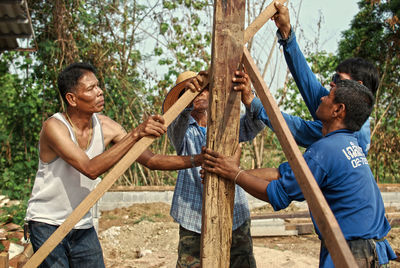 Manual workers working at construction site