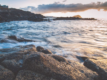 Scenic view of sea against sky during sunset