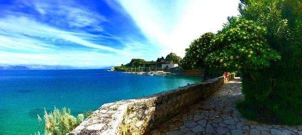 View of calm sea against cloudy sky