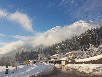 Scenic view of snow covered mountain against sky