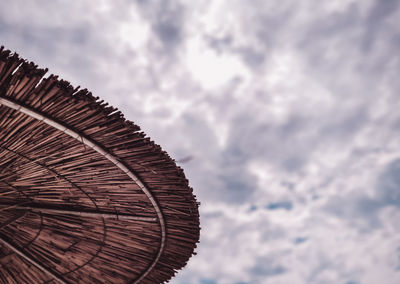 Low angle view of roof against sky
