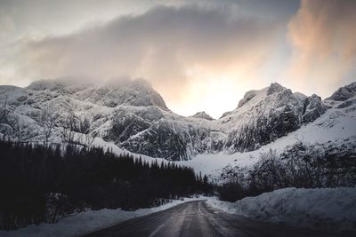 Scenic view of mountains against sky during winter