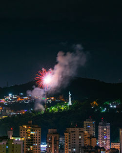 Night photo of the arrival of the new year, reveillon, with fireworks in the sky of a brazilian city