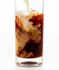 Close-up of ice cream in glass on table