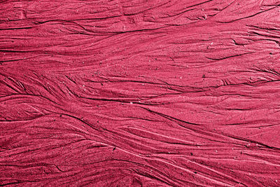 Natural sand pattern background. abstract magenta sand surface texture background.