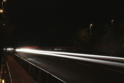 Light trails on road at night