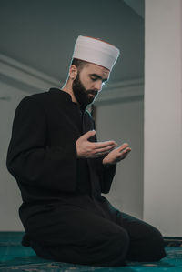 Low angle view of man in mosque