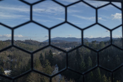 Field seen through chainlink fence