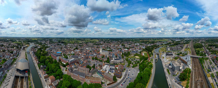 Aerial view of townscape against sky