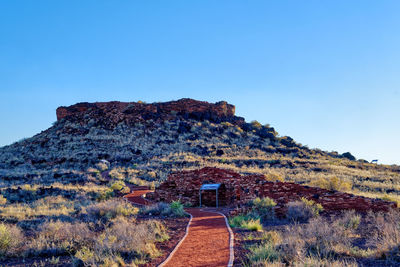 Scenic view of mountain against clear blue sky