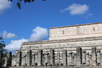 Low angle view of old building against sky