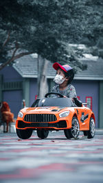 Man sitting in car