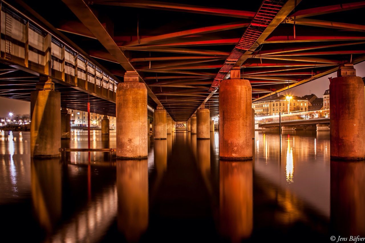 architecture, built structure, connection, bridge - man made structure, architectural column, engineering, column, illuminated, reflection, support, indoors, waterfront, river, transportation, water, bridge, long, travel destinations, travel, famous place