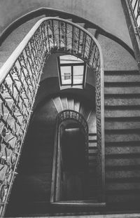 Low angle view of spiral staircase in building