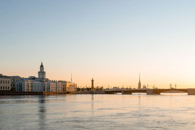 View of panorama of the city with neva river and historical buildings in white nights during dawn