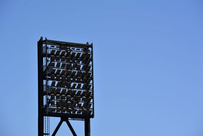 Low angle view of building against clear blue sky