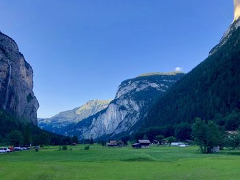 Scenic view of landscape and mountains against sky