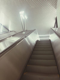 Low angle view of escalator in building