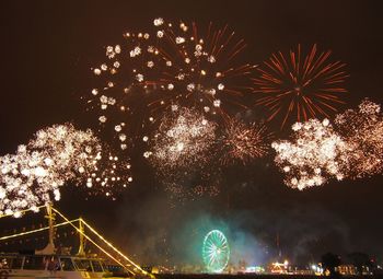 Firework display at night