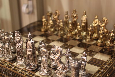 High angle view of chess pieces on table