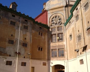 Low angle view of old building against sky