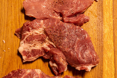 High angle view of chopped meat on cutting board