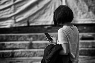 Woman using mobile phone