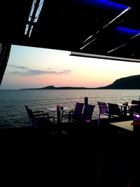 Scenic view of calm sea at sunset