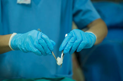 Close-up of hand holding ice cream